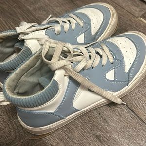 Blue and white sneakers for women.